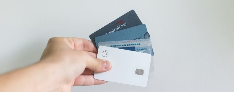 Photo of and holding credit cards